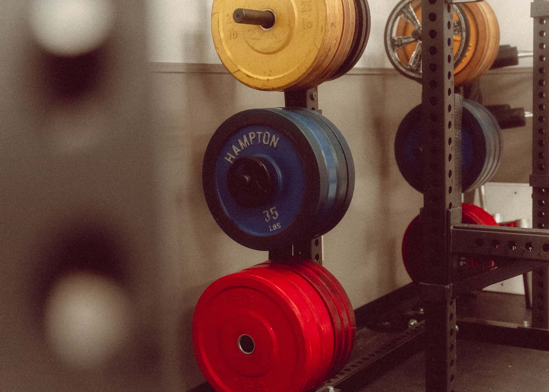 Close-up of an Olympic barbell's knurling and sleeve