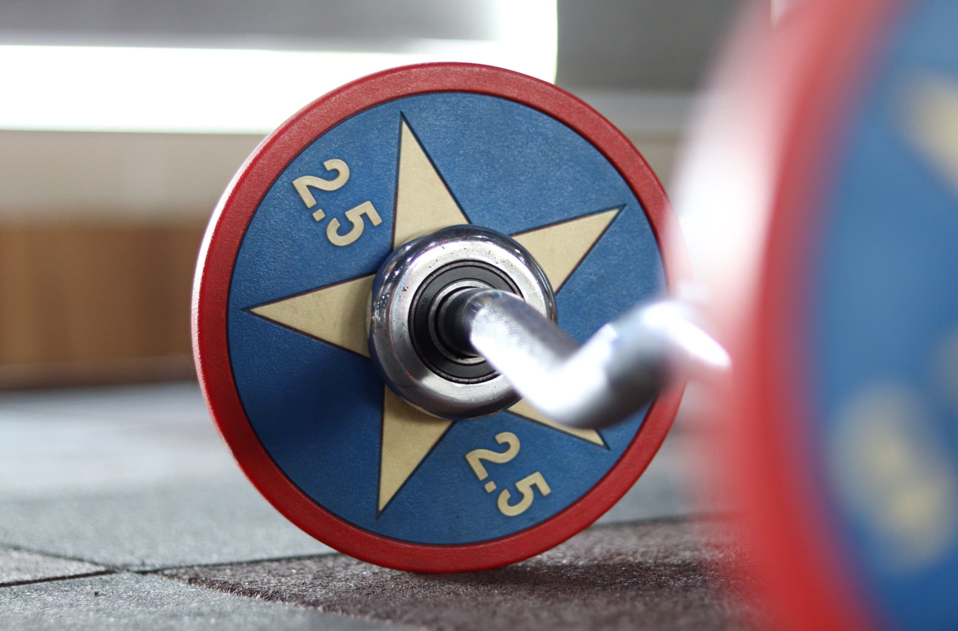 Macro detail of a barbell's diamond knurling